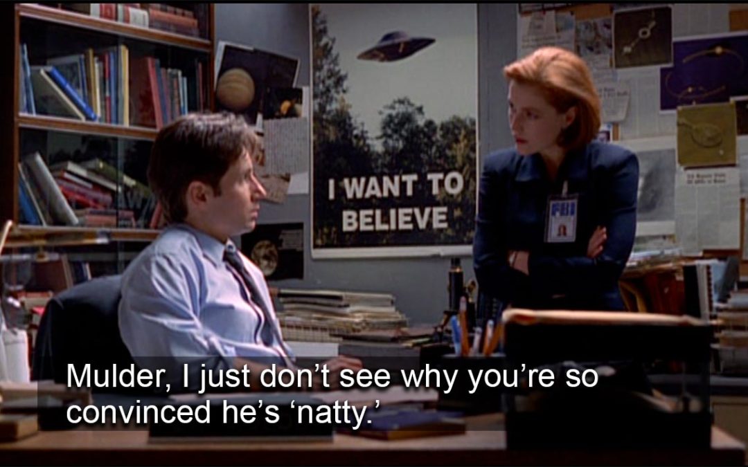 Mulder and Scully debating, with caption, "Mulder, I just don't see why you're so convinced he's 'natty.'"