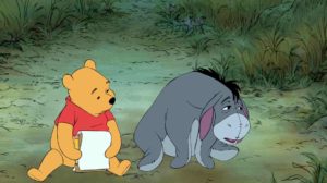 Pooh helping a friend